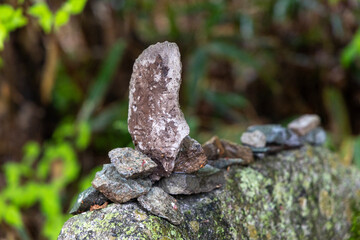 A small stone tower in the mountains