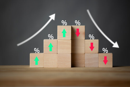 Predicting the stock market price crisis. Crisis and predictions of the increase or decrease of the stock market and business. on wooden block