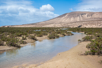 Tide coming in and lagoon filling up at Sotavento Beach, Costa Calma, Fuerteventura