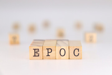 EPOC word. Chronic Obstructive Pulmonary Disease written in Spanish on wooden cubes isolated on white background with copy space for text.