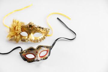 Elegant face masks on white background. Theatrical performance