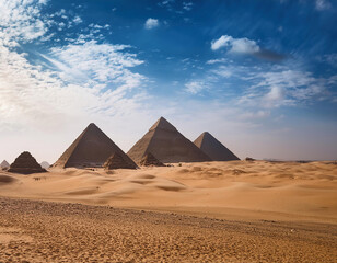 The great pyramids of Giza in Egypt under the blue sky