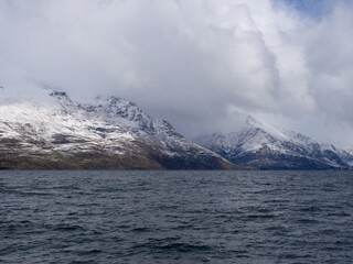 Snow Covered Mountains And Lake Wakatipu Queenstown New Zealand