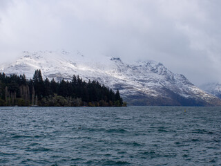 Snow Covered Mountains And Lake Wakatipu Queenstown New Zealand