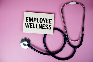 Employee Wellness program  text with stethoscope on pink background, Healthy and wellness concept
