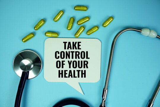 Take control of your health text with stethoscope and capsule medicine on blue background, Healthy and wellness concept