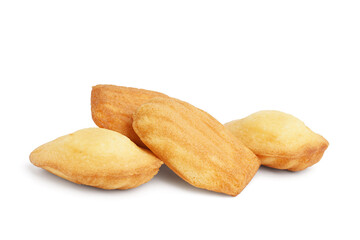 Tasty Madeleine cookies on white background