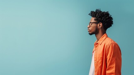 Obraz premium Minimalist portrait of a Black Afro-American data analyst with negative space emphasizing his calm demeanor.