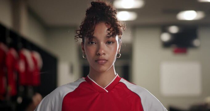 Fitness, confidence and face of woman soccer player in locker room for match, game or tournament. Serious, expression and portrait of young female athlete with challenge, courage or football