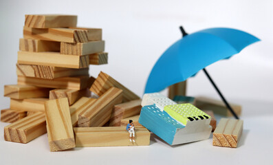 The concept of discrimination and inequality against marginalized people. A woman with a miniature...