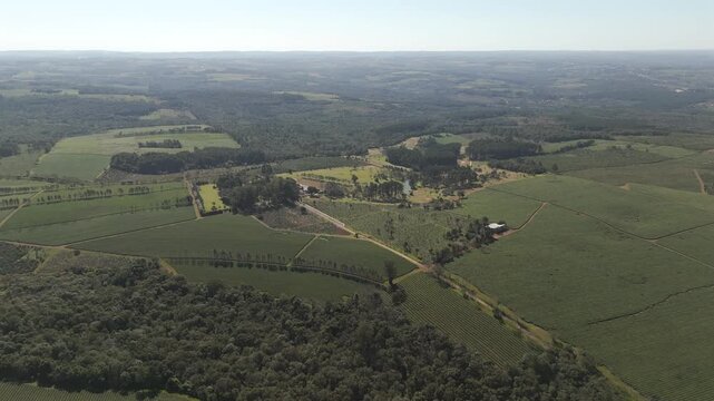 High altitude aerial view about the local golf club and green tea fields, Argentina.