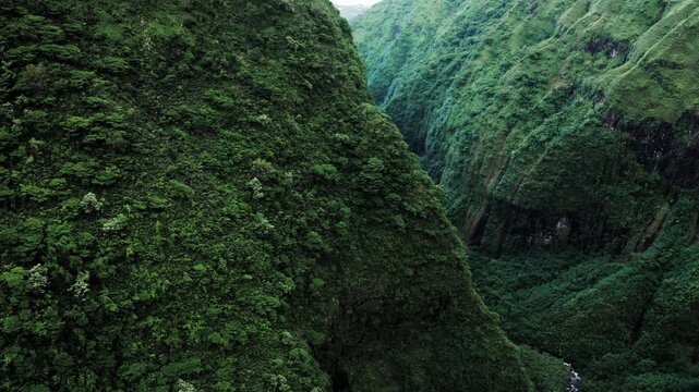 Teahupoo, Tahiti aerial drone view of the river in the valley of mountain Orohena Aorai Ronui. French Polynesia 2024 Paris Olympics surfing spot. Paradise in Pacific Ocean. Moana Disney inspiration