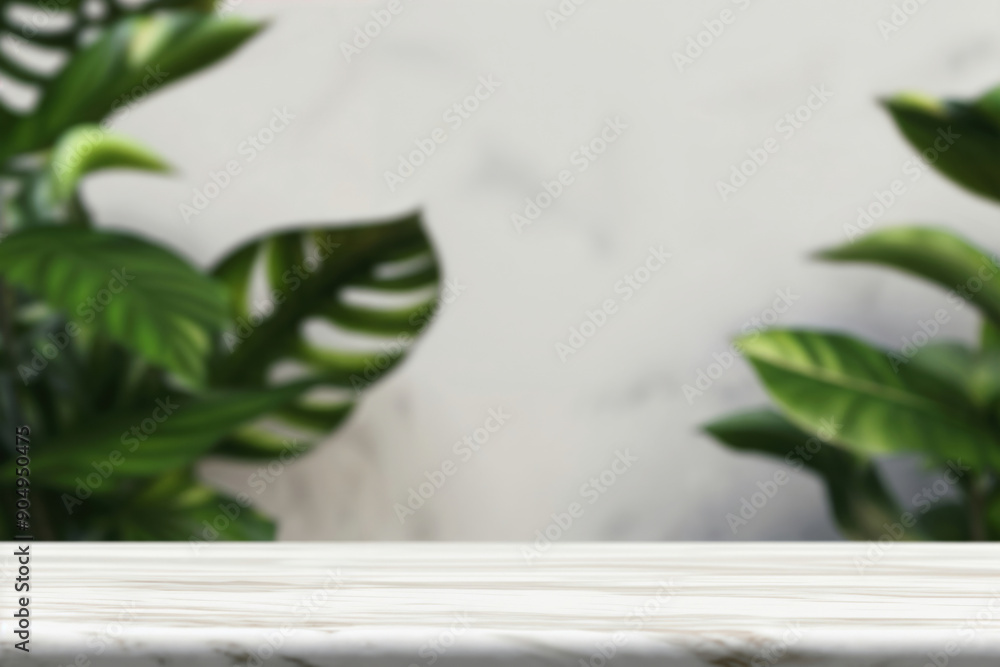 Aufkleber empty white marble table top for product display with blurred green plants background