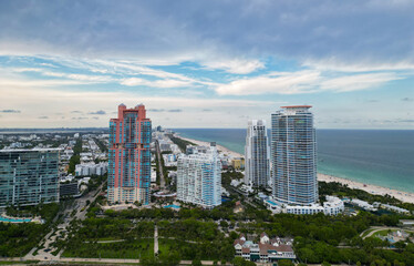 Fototapeta premium Cityscape of Miami south beach. Florida with modern skyscrapers in downtown Miami. Aerial skyscraper view. Aerial view of cityscape with skyscraper in Miami Beach. Skyline marina aerial cityscape