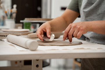 Removing air bubbles from clay before hand building. Preventing clay bodies from cracks by wedging....