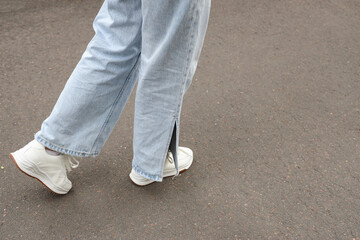 Woman going along road. Concept of new beginning