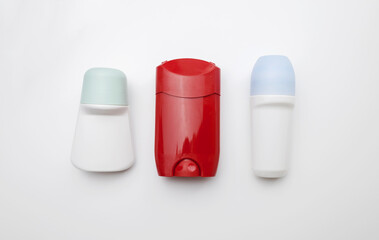 Choice of deodorant or antiperspirant. Looking at the jars on the table. Safe or critical deodorant ingredients