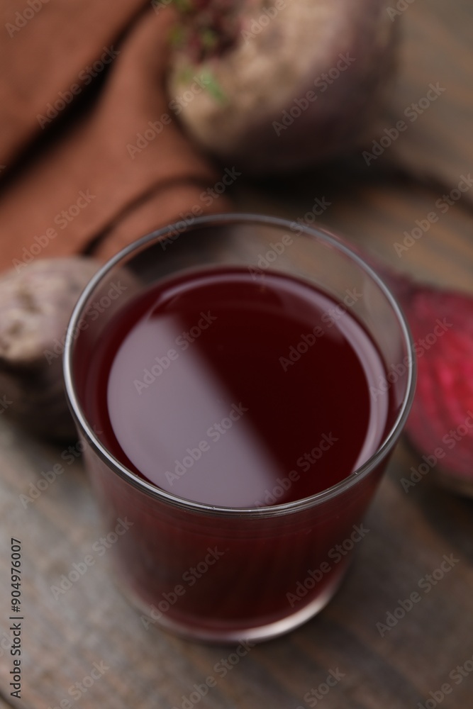 Canvas Prints fresh beet juice in glass and ripe vegetables on wooden table, closeup