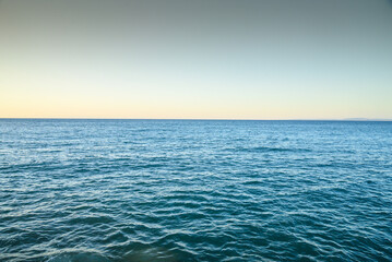 Obraz premium Blue sea water surface on sky
