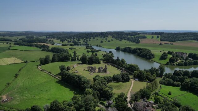 Sherborne, Dorset, England: DRONE VIEWS: The drone circles the outskirts of Sherborne revealing Sherborne Lake. Sherborne is an affluent market town and popular UK tourist destination (Clip 2).