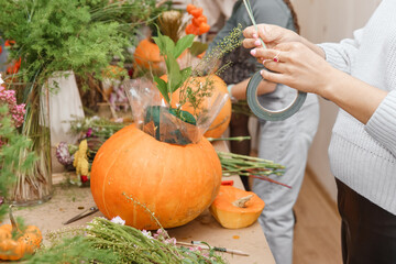 Creating a floral composition in a pumpkin. Making decor with your own hands.