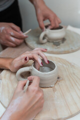 Making a pottery mug