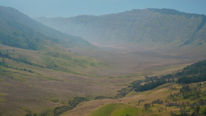 view of valley with fog