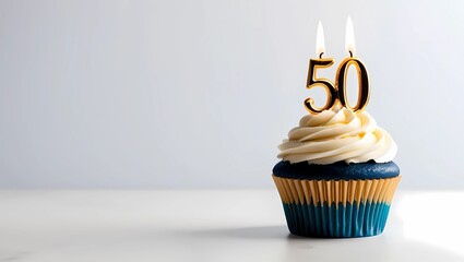 Golden Candle Number 50 on Blue Cupcake with White Frosting
