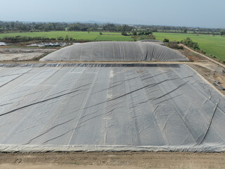 Covered lagoon digester for biogas production from poultry farm..