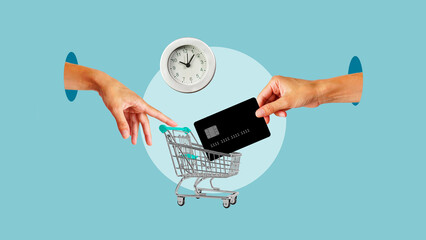 Hand with shopping cart and hand with credit card. Shopping time and buying with a credit card. Buy...