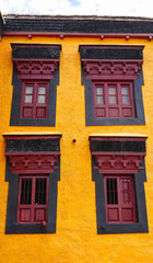 Fototapeta premium Wooden windows of Thiksey Monastery, Thiksey, Leh, Ladakh, India.
