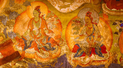 Colorful paintings of Buddhist deities in Thiksey Monastery, Thiksey, Leh, Ladakh, India.