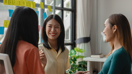 a group of entrepreneur has a small meeting in their office, friends are working together to build a startup company using their carefully thought out strategy to become successful young entrepreneurs