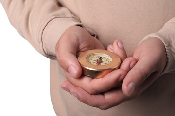 Man holding compass on white background, closeup