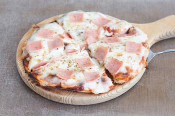 Close-up a slice of pizza. Selective focus on a specific area.