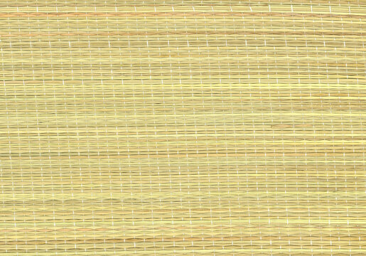 Straw beach and picnic mat detail background