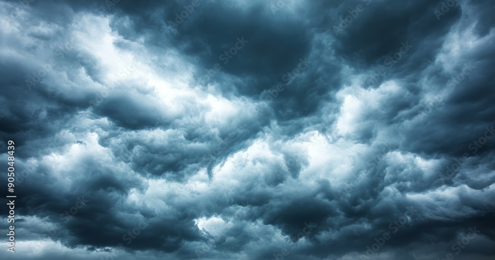 Poster there is a dark sky with stormy clouds before a thunderstorm. there is a dramatic sky with rain.