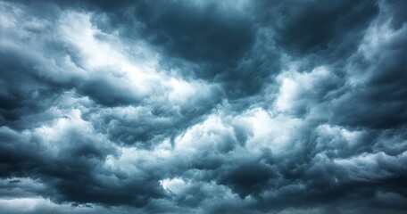 Obraz premium There is a dark sky with stormy clouds before a thunderstorm. There is a dramatic sky with rain.