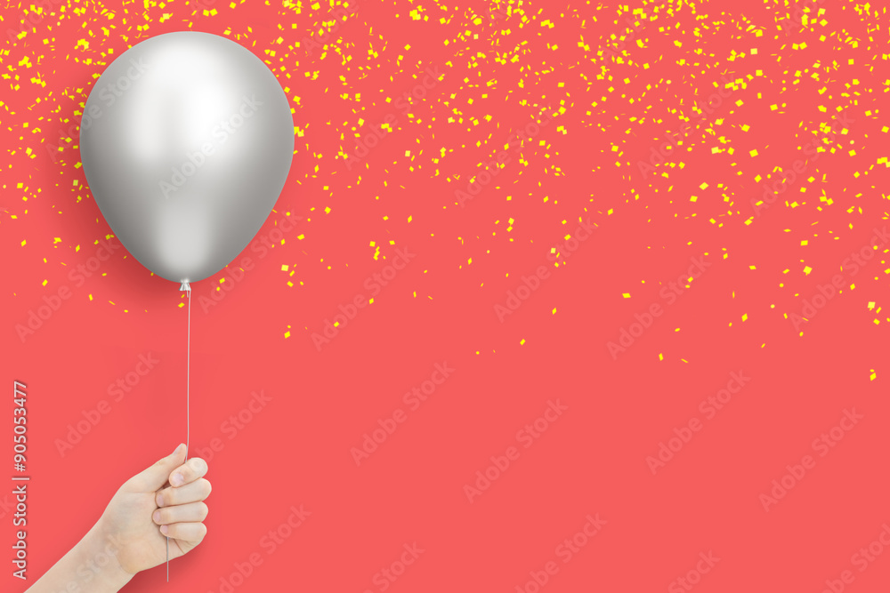 Poster female hand holds silver balloon on red background with confetti. empty space for text