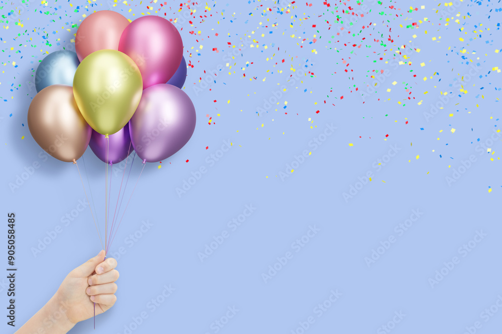Poster female hand holding bunch of shiny colorful balloons on blue background with confetti. empty space f
