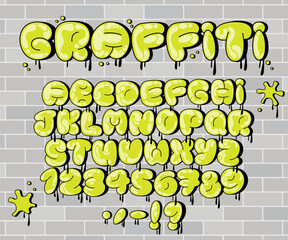 Graffiti Bubble Alphabet, Dripping Yellow green Paint Font with uppercase letters, numbers and punctuation. Shiny, dripping characters on brick wall. Perfect for street art, urban designs and logos.