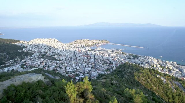 Aerial Pull back Shot of Kavala City Greece, Reveal Mountain, Panoramic Town View