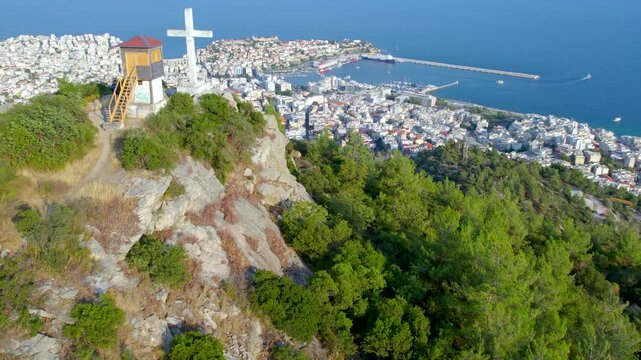 Kavala City Greece Reveal Shot, Aerial Panorama View of Town and Cross Monument, Mountain
