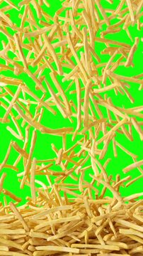 Fried potato chips falling down from above vertical green screen background. French fries falling down from top, fast food, junk food vertical chroma kay background.	