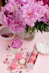 bouquet of peonies and dessert