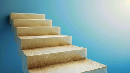 A set of concrete stairs leading upwards against a blue wall with sunlight streaming in.  Photo depicts ambition, success, and growth.
