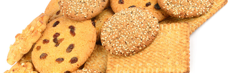 A variety of cookies isolated on a white. Wide photo.