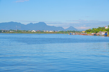 landscape of life and houses next to Thu Bon river in Hoi An ancient town, Quang Nam Province, Vietnam. Hoi An is one of the most popular destinations in Vietnam.