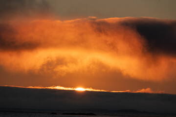 Dramatic colorful evening sky during the midnight sun in the Lofoten, Northern Norway