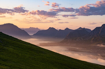 Fototapeta premium Wonderful nature with lakes and mountains during the midnight sun in Lofoten